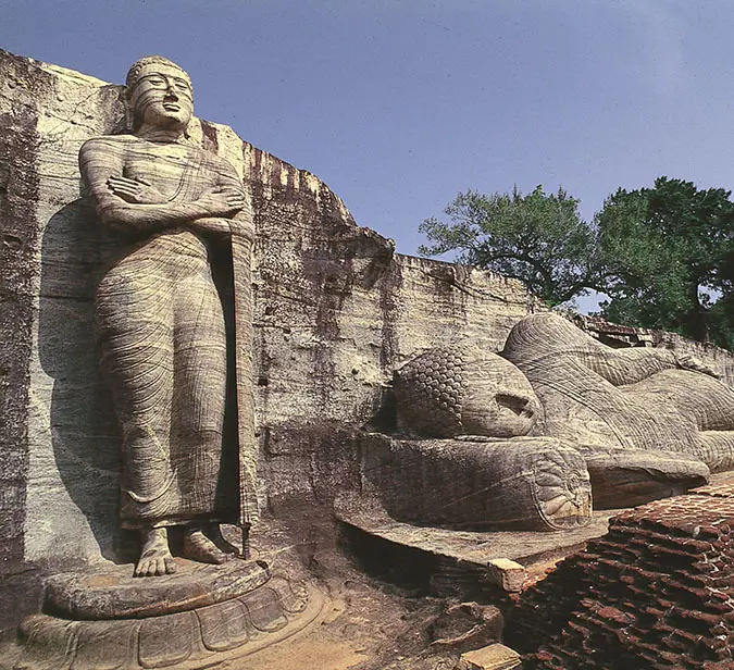 Majestic granite Buddha figures from Polonnaruwa, showcasing Sri Lanka’s rich heritage.