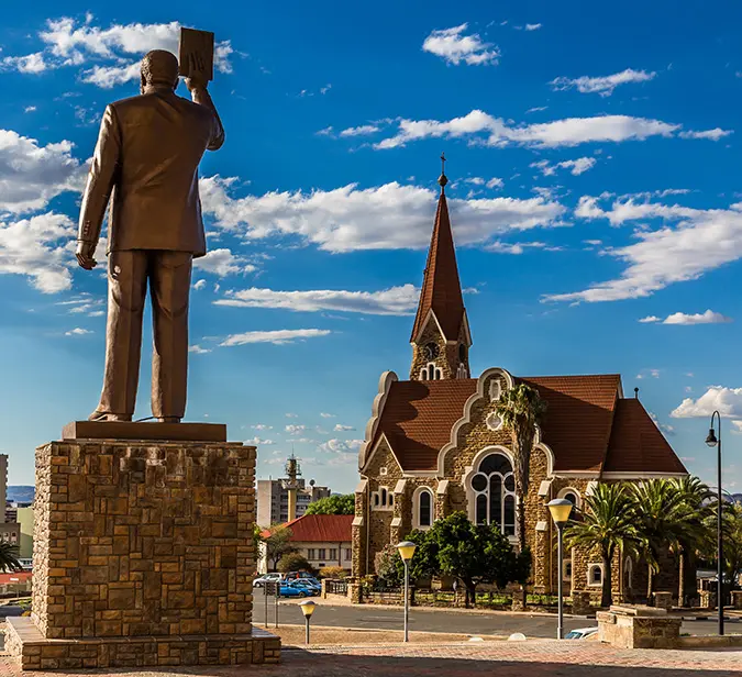 Windhoek city view with historic church and monument on a sunny day.