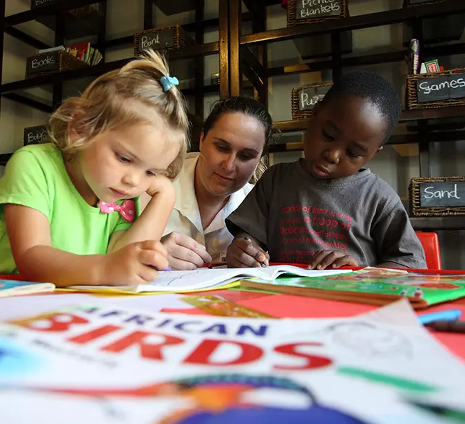 Children engaged in a wildlife-themed activity during a ranger training school experience.